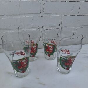 4- 1996 Coca-Cola Happy Holidays Christmas Glasses,  Santa Enjoying A Toy Train